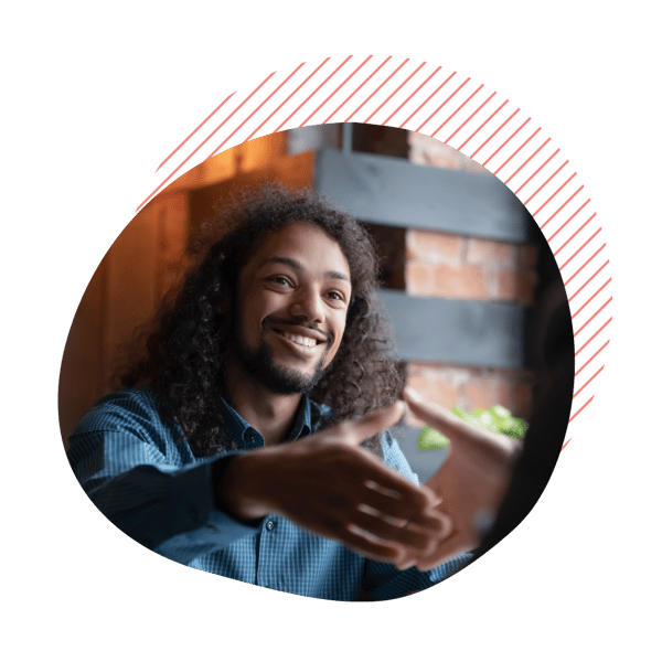 Mixed race black guy, smiling extending a handshake